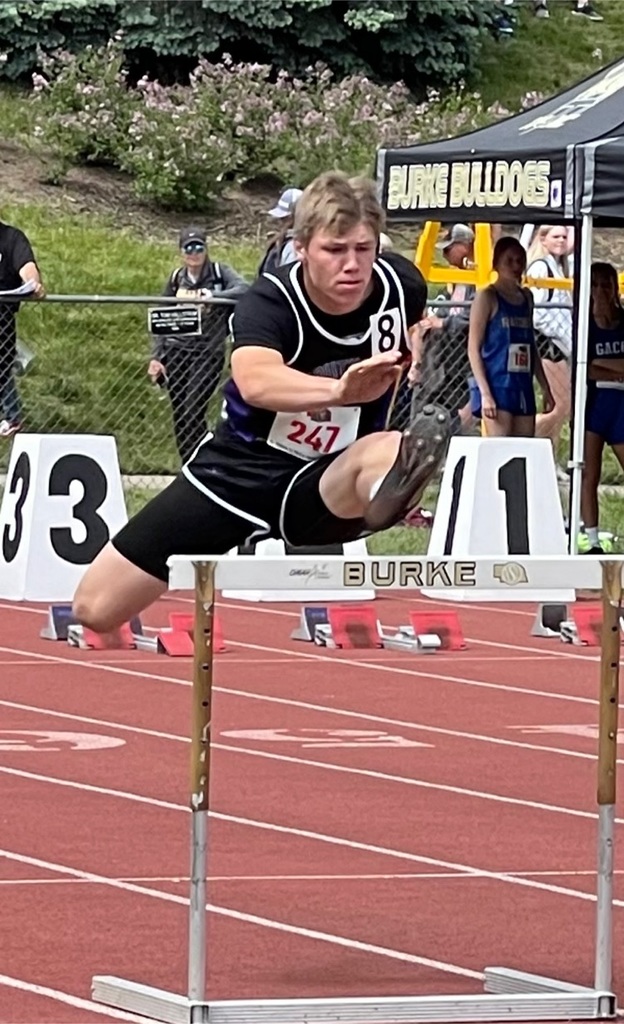 Trevor Brown running 110 High Hurdles at the State Track Meet.